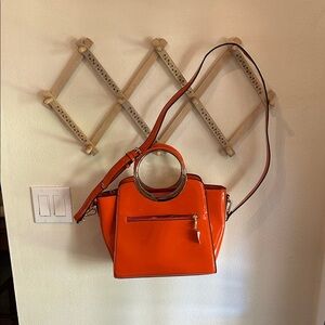 Retro Inspired Orange Faux patent leather statement Handbag with Circular Handle